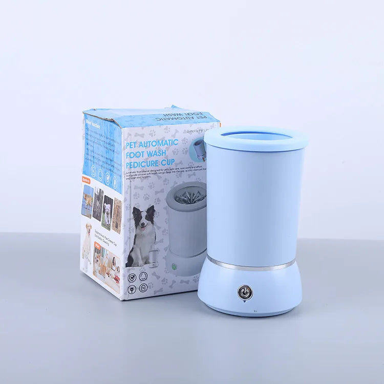 Dog paw cleaner cup held in hand to show its portable size